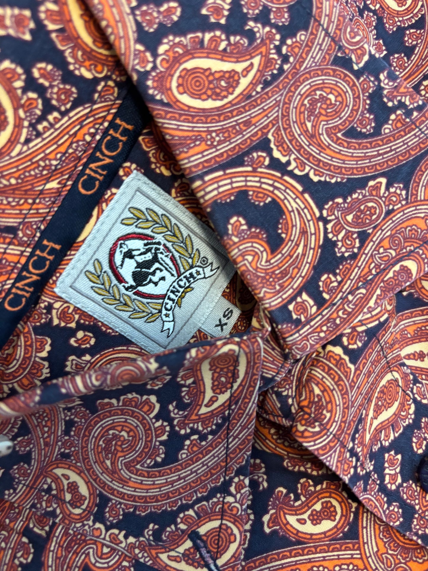 ORANGE/NAVY PAISLEY CINCH BUTTON UP SHIRT