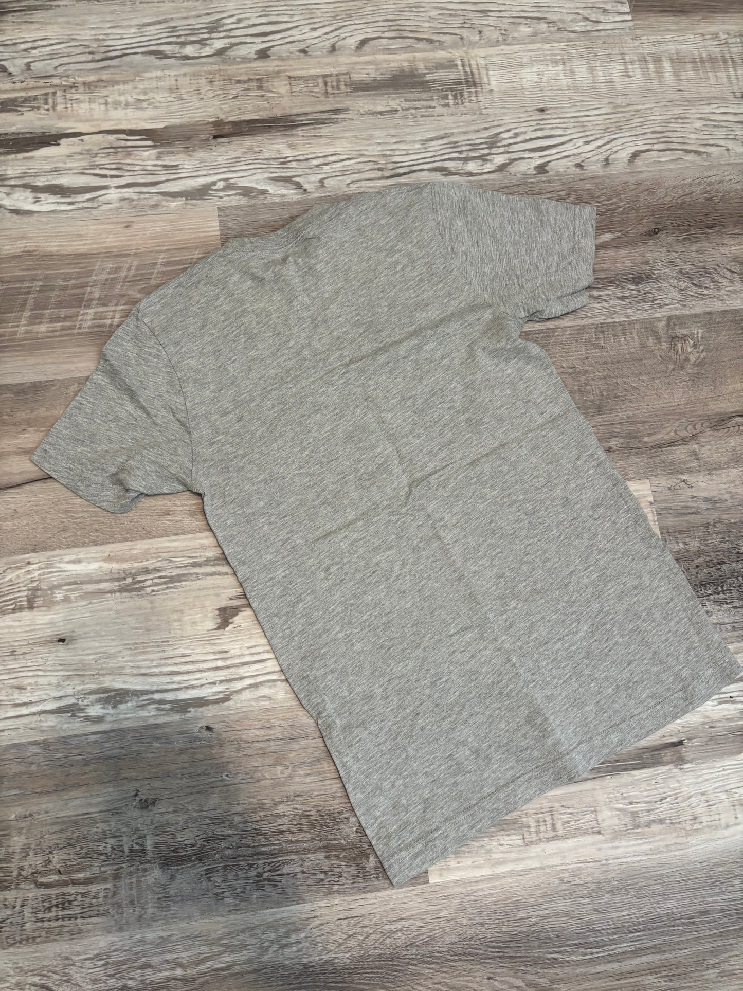 MAMAS DONT LET YOUR COWBOYS GROW UP TO BE BABIES GRAPHIC TEE