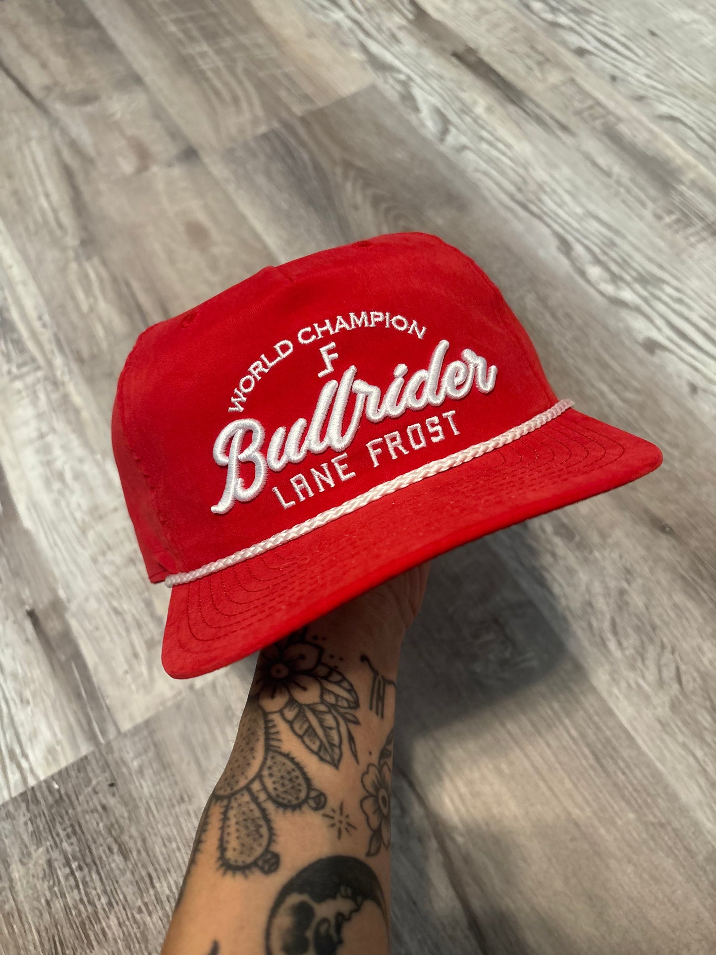 LANE FROST WORLD CHAMPION BULL RIDER TRUCKER SNAPBACK HAT